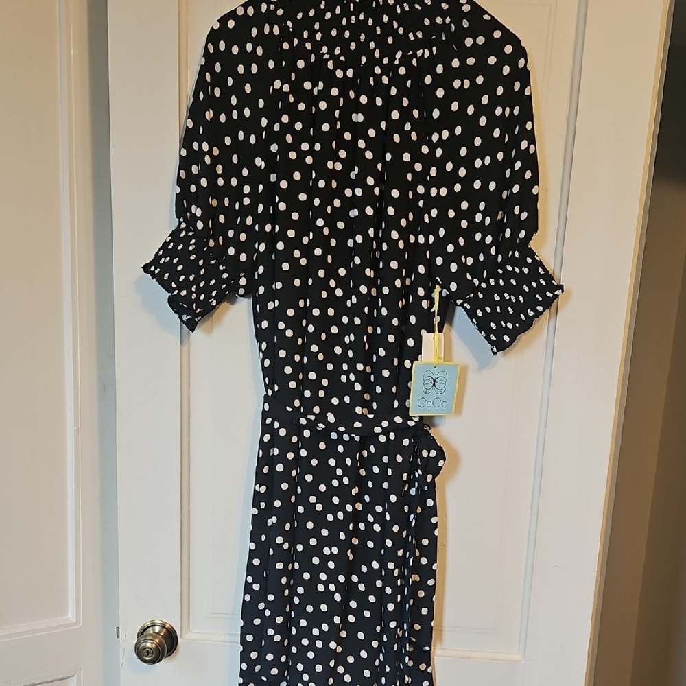 CeCe Black and White Ruched Wrap Dress